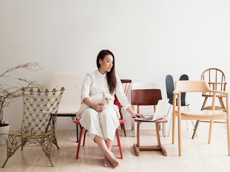Bella Koh with her cat and furniture picks